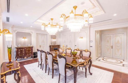 a dining room with a table and chairs at Hilton Garden Inn Samarkand Sogd in Samarkand