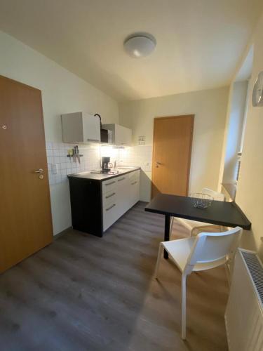 Η κουζίνα ή μικρή κουζίνα στο Apartments in der Rostocker Innenstadt