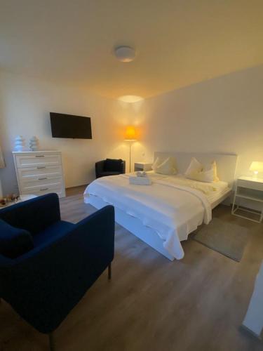 Ένα ή περισσότερα κρεβάτια σε δωμάτιο στο Apartments in der Rostocker Innenstadt