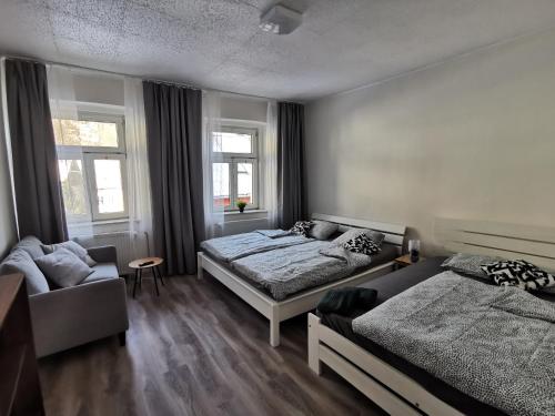 מיטה או מיטות בחדר ב-Apartmány Cipriani