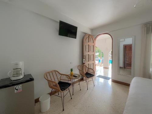TV a/nebo společenská místnost v ubytování Hotel Mar Rey