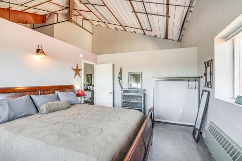 a bedroom with a large bed in a room at Downtown Del Norte Apartment Ski, Hike and Shop! in Del Norte