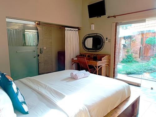 Postel nebo postele na pokoji v ubytování S Bali Villa