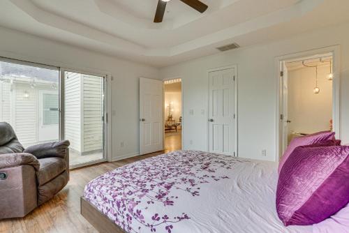 a bedroom with a large bed and a couch at Tranquil Fort Wayne Home 7 Mi to Downtown in Fort Wayne