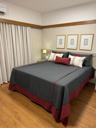 Una cama o camas en una habitación de Gaben Hotel