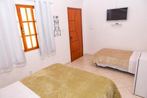 Postel nebo postele na pokoji v ubytování Peniel do Sana Guest House
