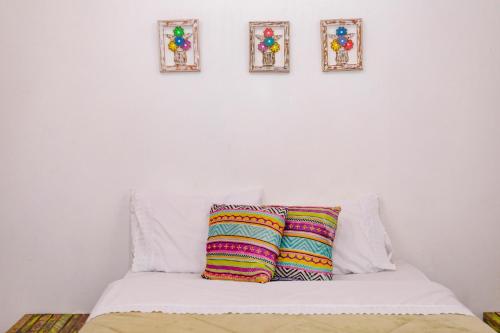 Postel nebo postele na pokoji v ubytování Peniel do Sana Guest House