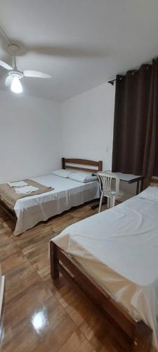 Postel nebo postele na pokoji v ubytování Hotel Barroco