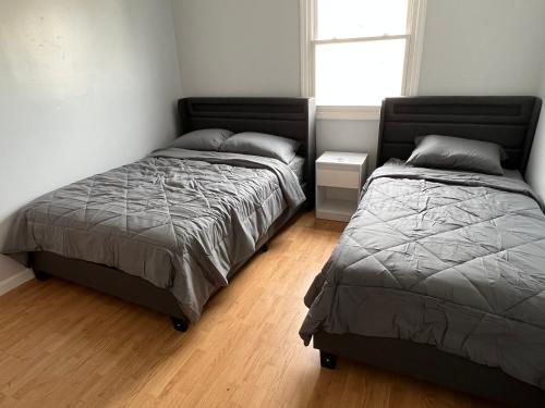 Ein Bett oder Betten in einem Zimmer der Unterkunft Cozy apartment nexttomain st