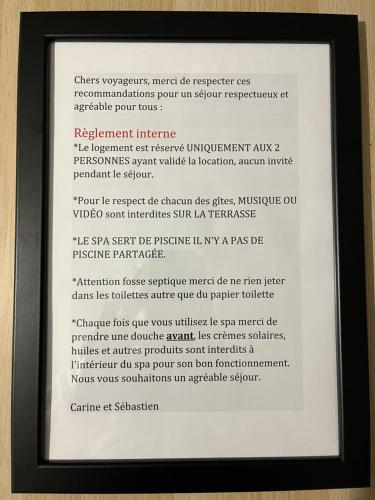 a picture of a document in a black frame at Pause spa sur la route du Ventoux adults only in Carpentras