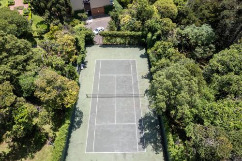 Tenis dan/atau kemudahan skuasy di Hotel Serrano Gramado - Apto Particular 452 atau berdekatan