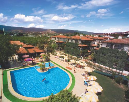 an overhead view of a swimming pool at a resort at Titan Club Hotel Ultra All Inclusive in Kargicak