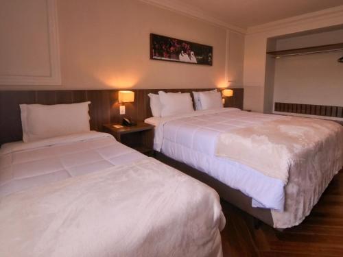 Katil atau katil-katil dalam bilik di Hotel Serrano Gramado - Apto Particular 452