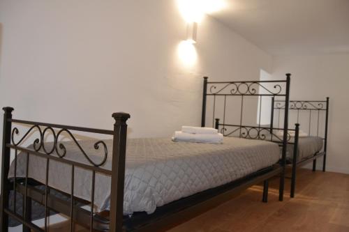 Giường trong phòng chung tại Casa Alma