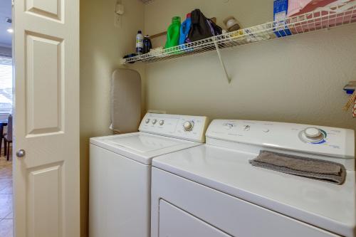 a laundry room with a washer and dryer at Charming Scottsdale Condo with 2 Resort Pools in Scottsdale