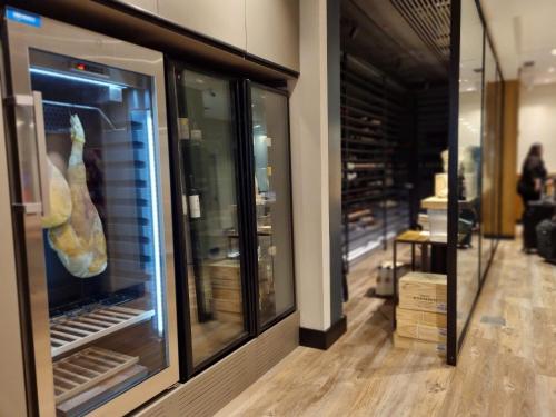 a store with a display case with food in it at Fierro Hotel Buenos Aires in Buenos Aires