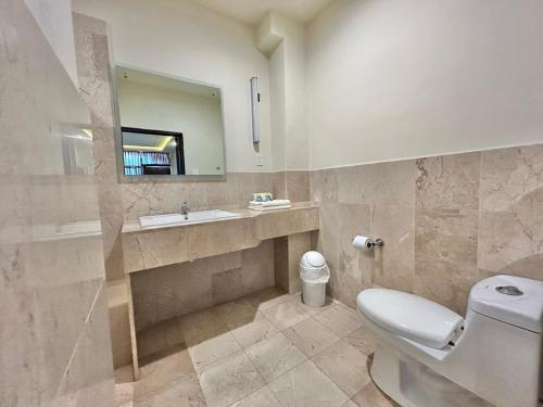 Kylpyhuone majoituspaikassa Hotel Yorio Inn