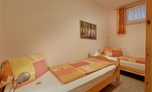 Posteľ alebo postele v izbe v ubytovaní Ferienwohnung Seethaler - Gartenblick