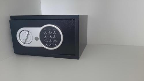 a black and white microwave with a control panel at Departamento en el Centro in Puerto Madryn