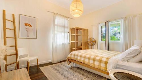 Llit o llits en una habitació de Brunswick Riverfront Guest House