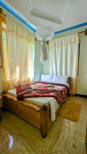 Katil atau katil-katil dalam bilik di Galapagos Homestay