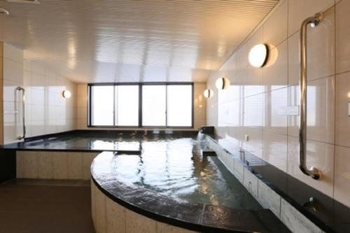 Fotografie z fotogalerie ubytování Hotel Alpha-One Tsuruga Bypass v destinaci Curuga