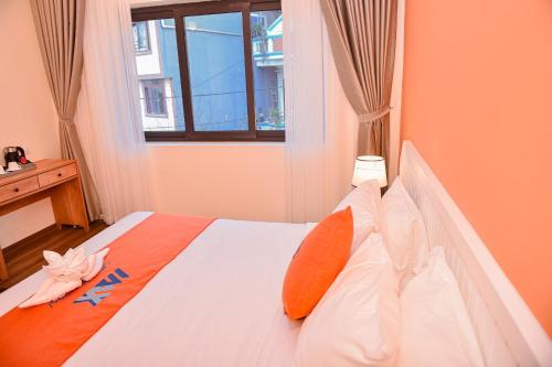 Sapa Legacy Hotelにあるベッド