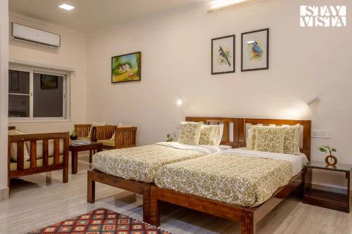 Voodi või voodid majutusasutuse StayVista at Verdant Acres - Guest Favourite toas