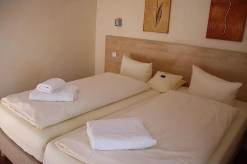 Postel nebo postele na pokoji v ubytování 4 Sterne Apartment Hühnergott mit Terrasse und Sauna