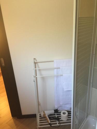 a bathroom with a shower with a towel at Aquila Di Mare in Fiumicino