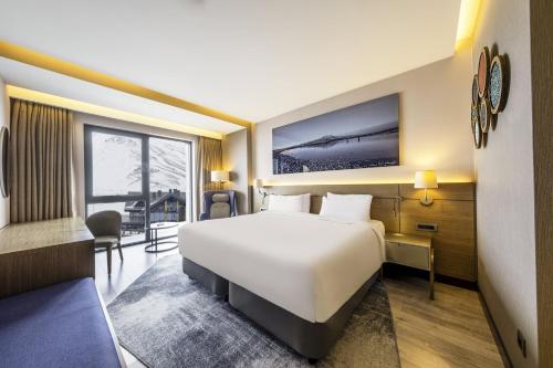 Ένα ή περισσότερα κρεβάτια σε δωμάτιο στο Radisson Blu Hotel, Mount Erciyes