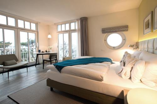 Postel nebo postele na pokoji v ubytování Hotel AM MEER & Spa