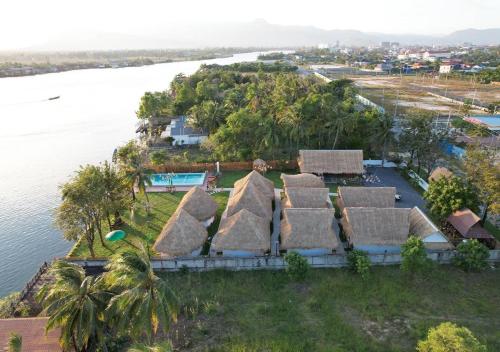 an aerial view of a house with thatched roofs at SEA SAND RESORT in Kampot