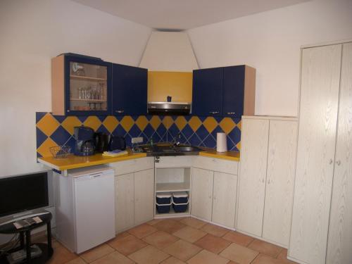Kuchyň nebo kuchyňský kout v ubytování Villa Mutabor