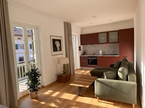 muchhome LUXURY APARTMENTS - Stilvolle Apartments am Tegernsee tesisinde bir oturma alanı