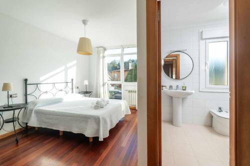 Ένα μπάνιο στο Vivienda Vacacional Casa El Henar