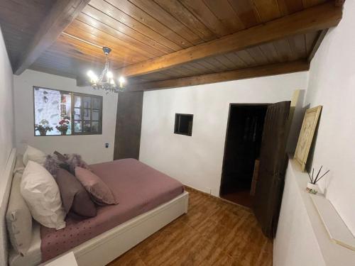 Cama o camas de una habitación en Finca Samuel and Apartments