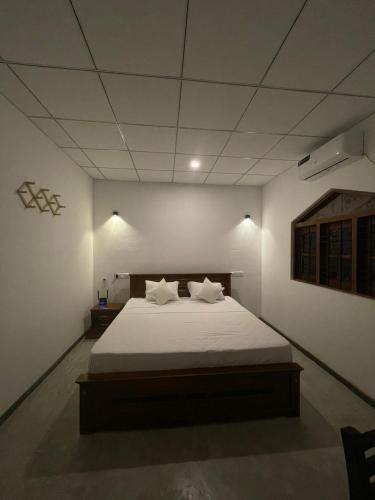 Ένα ή περισσότερα κρεβάτια σε δωμάτιο στο Villa Blancas