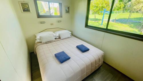 Postel nebo postele na pokoji v ubytování Orere Point TOP 10 Holiday Park