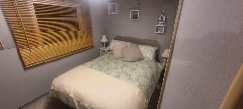 Кровать или кровати в номере The Family Van - Withernsea