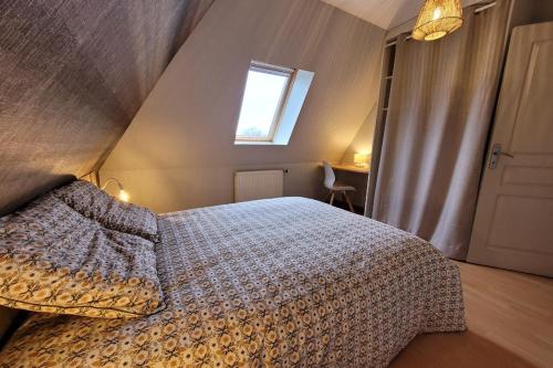 Postel nebo postele na pokoji v ubytování Gîte de Lourmel