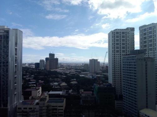 a view of a city with tall buildings at KL Tower Makati Apartments by PH Staycation in Manila