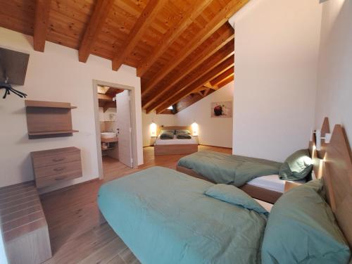 Una cama o camas en una habitación de Agritur Clementi