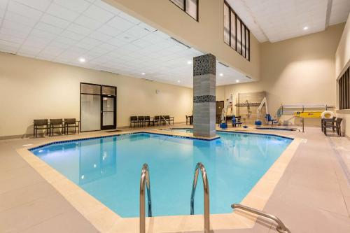 a large swimming pool in a large room with at Hilton Club The District Washington DC in Washington