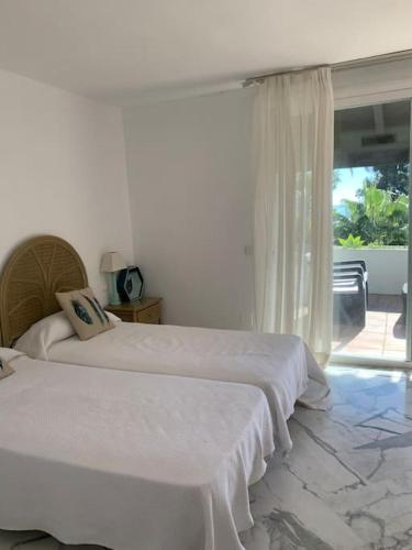 Кровать или кровати в номере Casa en primera línea de playa