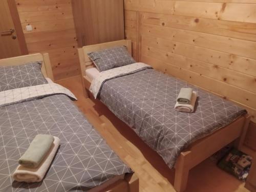 מיטה או מיטות בחדר ב-LAna