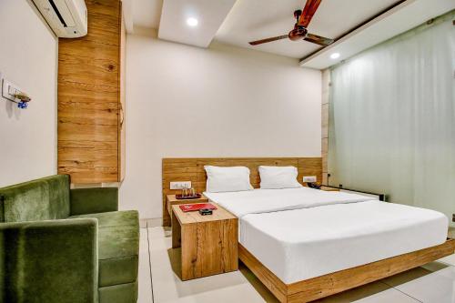 Postel nebo postele na pokoji v ubytování FabHotel Prime Manjeet