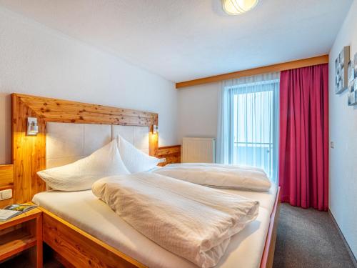 Posteľ alebo postele v izbe v ubytovaní Apartment Sailer-3 by Interhome