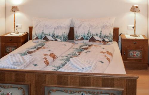 a bedroom with a bed with two night stands at Beautiful Home In Wald Am Arlberg With Wi-fi in Wald am Arlberg