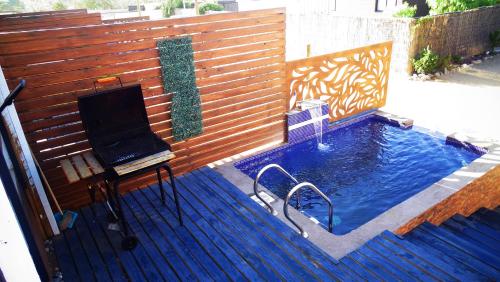 WANNAQUEROS SUITESの敷地内または近くにあるプール